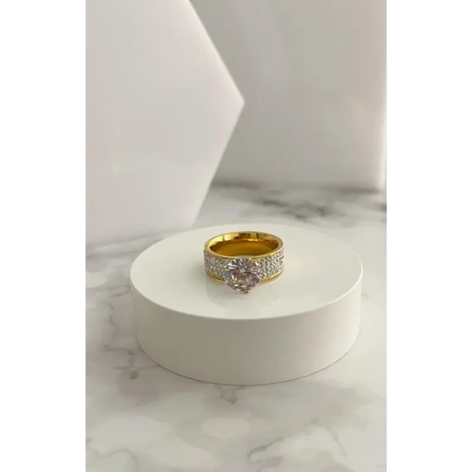 ANILLO EN ACERO DORADO CON CIRCÓN Y BOLA DE FUEGO