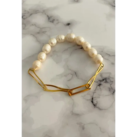 PULSERA EN ACERO CON PERLA DE RIO